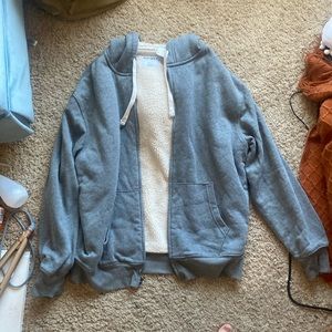 Old Navy grey zip up jacket with hood Size is a L (Large)